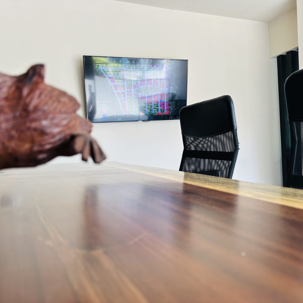 Custom parota wood conference table at the Salmo 23 Real Estate corporate office in Huatulco.